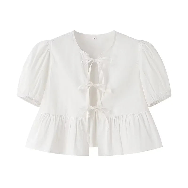 Meggy | Elegant Peplum Blouse with Front Bow