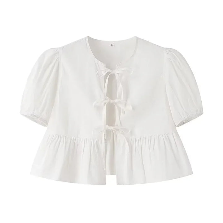 Meggy | Elegant Peplum Blouse with Front Bow